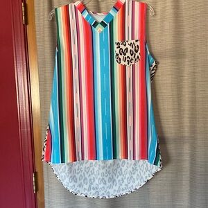 Very cute and colorful sleeveless blouse- size L.